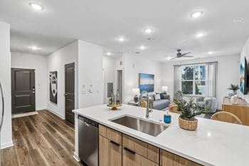 Open concept kitchen with island and living area